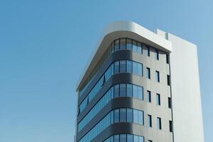 New building architecture on blue sky background,Low angle architectural exterior view of modern,copy space for text photo