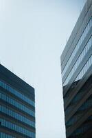 New building architecture on blue sky background,Low angle architectural exterior view of modern,copy space for text photo