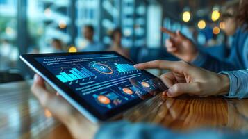 A person using a tablet with data on it photo