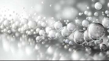 Silver bubbles on a gray background with a white background photo