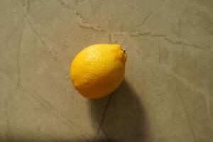 lemon path isolated on grey background photo