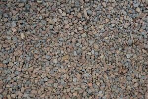 Processed collage of sea shore pebbles texture. Background for banner, backdrop or texture for 3D mapping photo