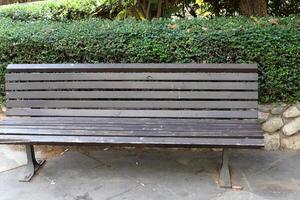 bench for rest in the city park photo