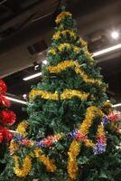 Artificial Christmas trees are sold in a store in Israel photo