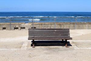 bench for rest in the city park photo