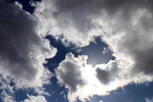 white clouds are floating across the sky photo