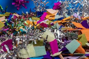 Colorful paper and tinsel decorations for festive party celebrations photo