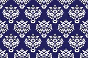 Elegant White floral damask pattern on a navy blue background. Classic ornamental design. vector