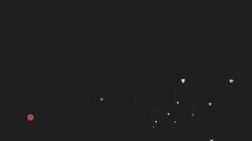 Fireworks on the dark sky background. Colorful fireworks. Abstract colored firework background with free space for text. fireworks light up the night sky video