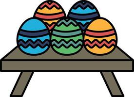 A table with five colorful eggs on it vector