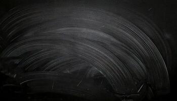 Blackboard with white chalkboard. Abstract black background. Blackboard. Chalk rubbed out on blackboard background. photo