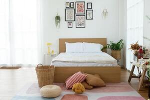 Cozy Bedroom With a Minimalistic Design and Natural Light in a Tranquil Setting photo