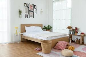 Cozy Bedroom With a Minimalistic Design and Natural Light in a Tranquil Setting photo