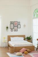 Cozy Bedroom With a Minimalistic Design and Natural Light in a Tranquil Setting photo
