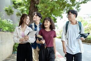Students Enjoying a Sunny Day While Walking on Campus in the Afternoon photo
