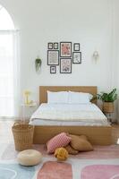 Cozy Bedroom With a Minimalistic Design and Natural Light in a Tranquil Setting photo