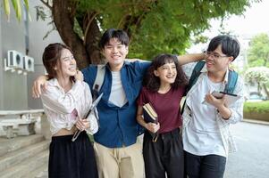Students Enjoying a Sunny Day While Walking on Campus in the Afternoon photo