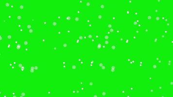 Snowfall overlay across a green screen. Winter softly falling snow effect animation. video
