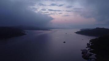 Aerial view of beautiful fog on the lake in the morning. Fresh early morning in the forest near the river. Beautiful sunrise in the forest with fog. video