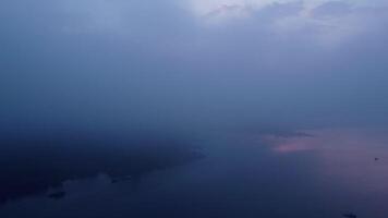 Aerial view of beautiful fog on the lake in the morning. Fresh early morning in the forest near the river. Beautiful sunrise in the forest with fog. video