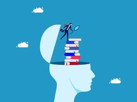 businessman is standing on top of a stack of books and a magnifying glass vector