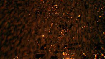 Golden particle waves, Abstract sparkles swirls on dark background. video
