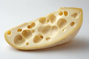 Wedge of Maasdam Cheese with Holes and Smooth Texture photo