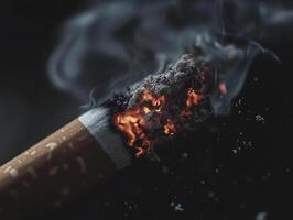 Close Up of a Burning Cigarette with Heavy Smoke Capturing the Intensity and Hazards of Smoking photo