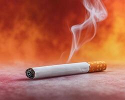 Cigarette Burning Slowly with Smoke Rising Against Orange Background Capturing the Essence of Smoking photo