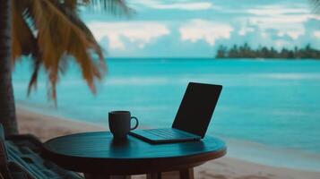 Remote Work Setup with Laptop and Coffee Mug on a Tropical Island photo