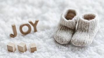 Tiny Baby Booties on Soft Carpet with Play Cubes Reading Joy Highlighting Innocence photo