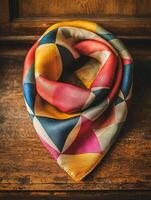 Close-Up of Colorful Silk Scarf Highlighting Luxurious Texture and Vibrant Design photo