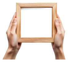 Hands with an empty wooden frame outside png