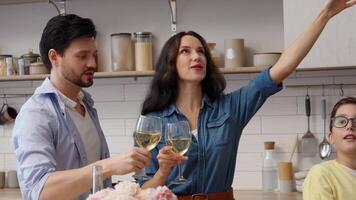 Celebrating a joyful gathering in the kitchen with family and friends video