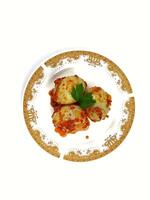 Egg Balado. Balado is a type of hot and spicy bumbu spice mixture found in Indonesian cuisine. Balado sauce is made by stir frying ground red hot chili pepper with other spices photo