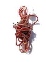red and white power cables on white photo