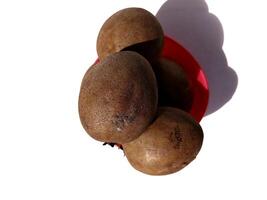 sapodilla on white background photo
