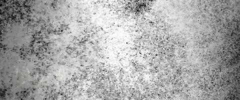 Grunge-style abstract texture in black and white with speckled details, ideal for backgrounds or artistic overlays. photo