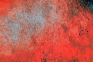 Vivid red and blue grunge texture with distressed patterns, scratches, and rough artistic effects. photo