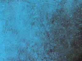 Distressed blue grunge texture with weathered and rustic elements, perfect for creative or industrial design projects. photo