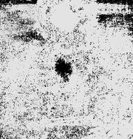 Monochrome grunge texture with speckled and distressed patterns, ideal for backgrounds, overlays, or artistic projects. photo