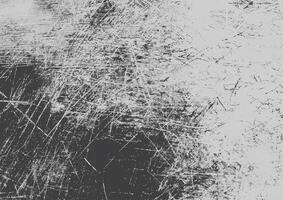 High-contrast grunge texture featuring irregular scratches and distressed patterns on a dark background. photo