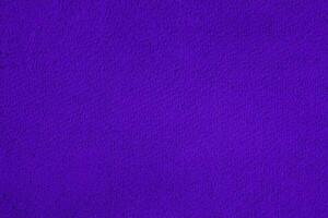 Vivid purple textured paper surface, ideal for artistic backgrounds, graphic design, and creative projects. photo