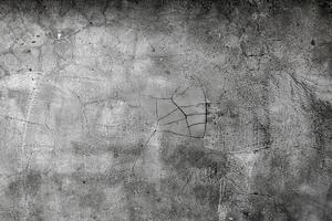 Grey textured concrete background with visible scratches, cracks, and abstract patterns. photo