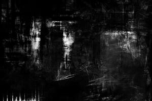 Dark textured grunge background with abstract streaks, scratches, and rough surface patterns. photo