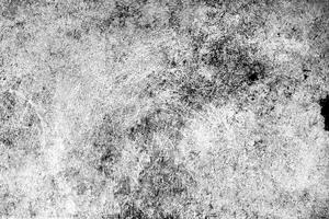 Rough textured surface in black and white with grunge patterns and distressed details, perfect for design use. photo