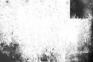 Grunge black-and-white texture background with distressed splatter patterns, suitable for abstract design projects. photo