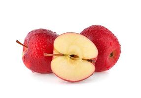 red apple with drop of water on white background. photo