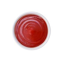 Bowl of ketchup or tomato sauce isolated on white background, top view photo