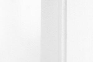 White Pole and Gray Wall Background with Natural Light and Shadow on the Surface. photo